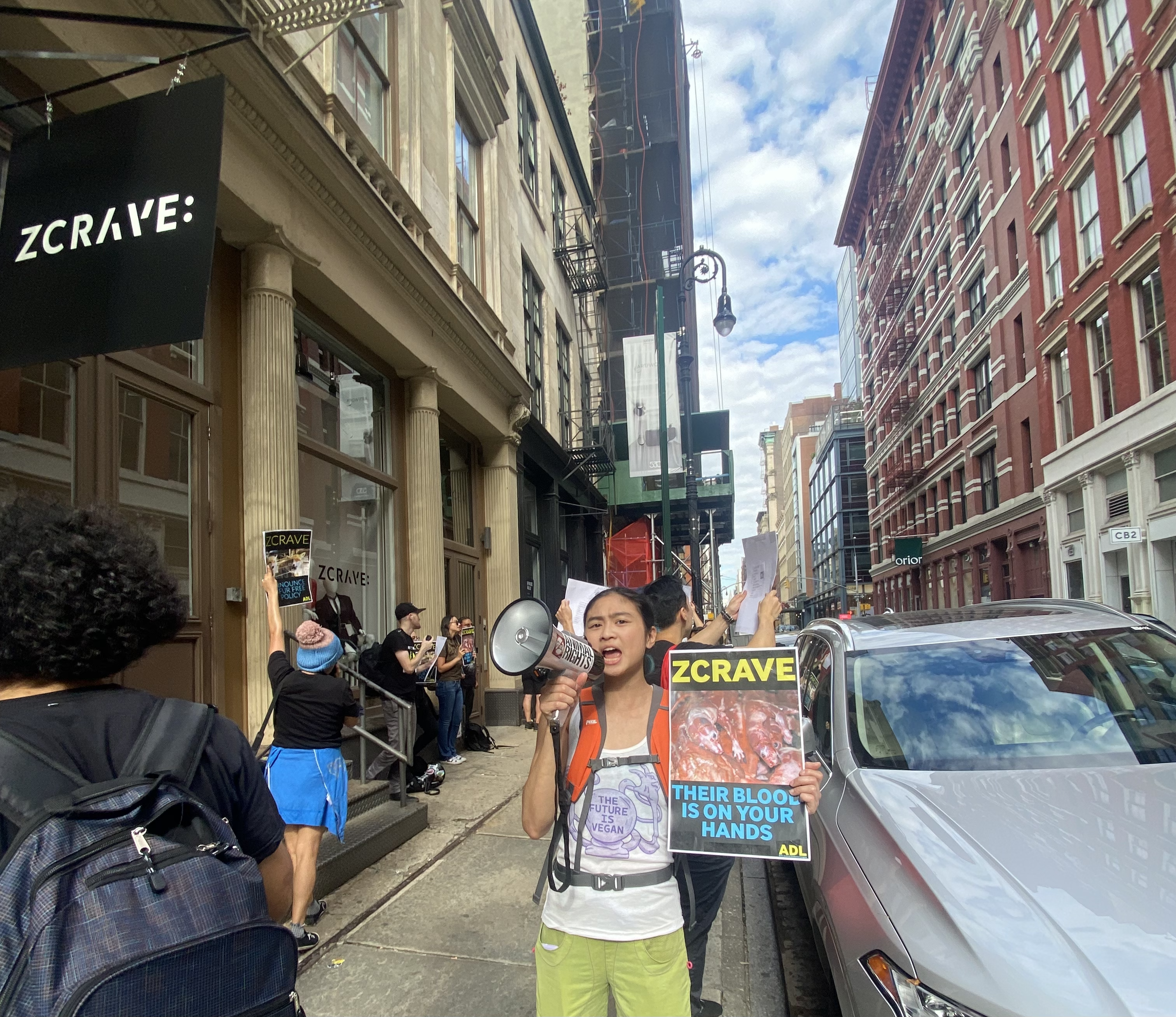 Activists protesting the ZCRAVE storefront